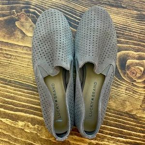 Tan/gray colored flats